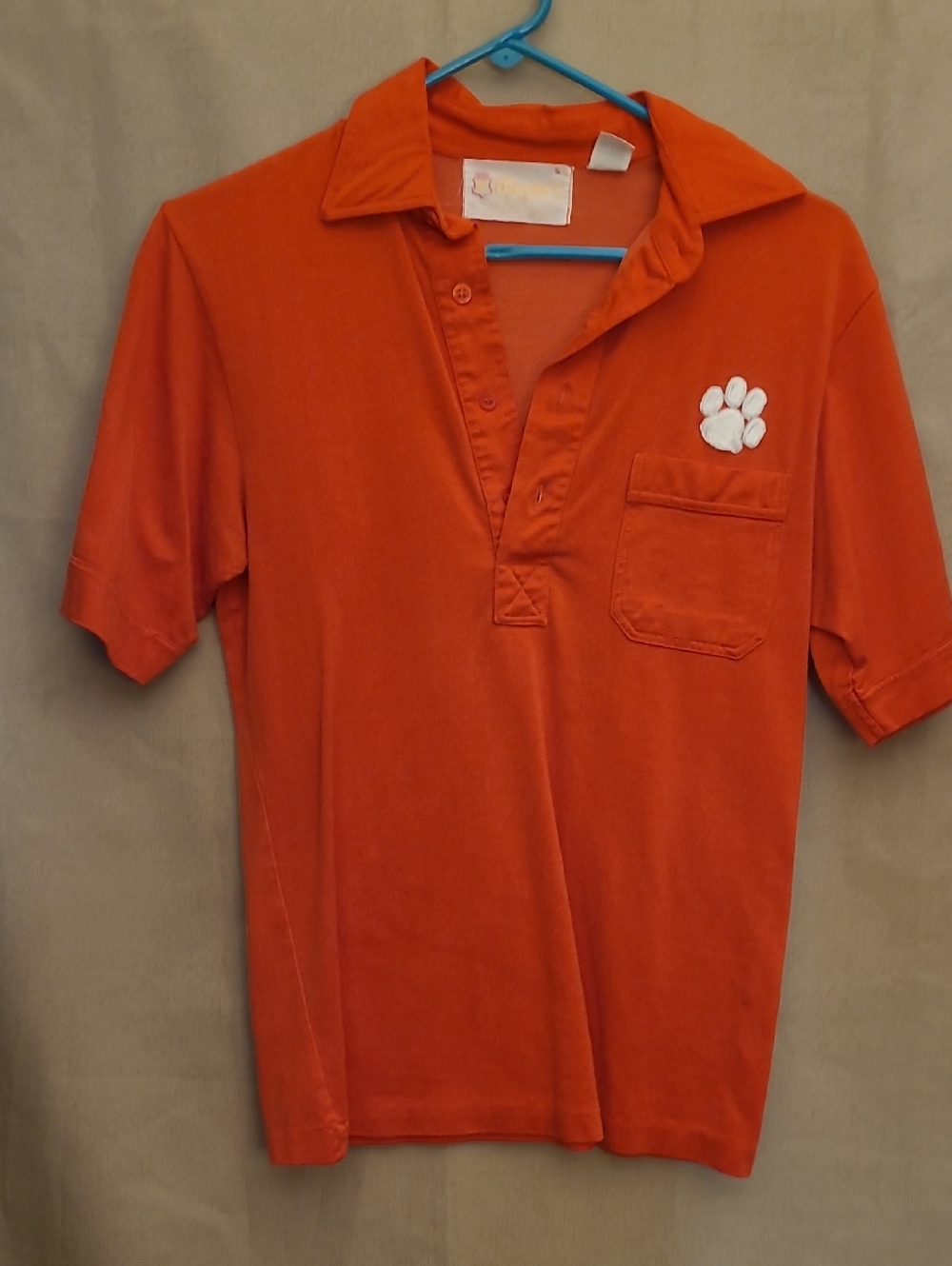 Orange Polo Shirt with White Paw Patch